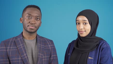 Portrait-of-African-young-Muslim-man-and-African-Muslim-young-woman.